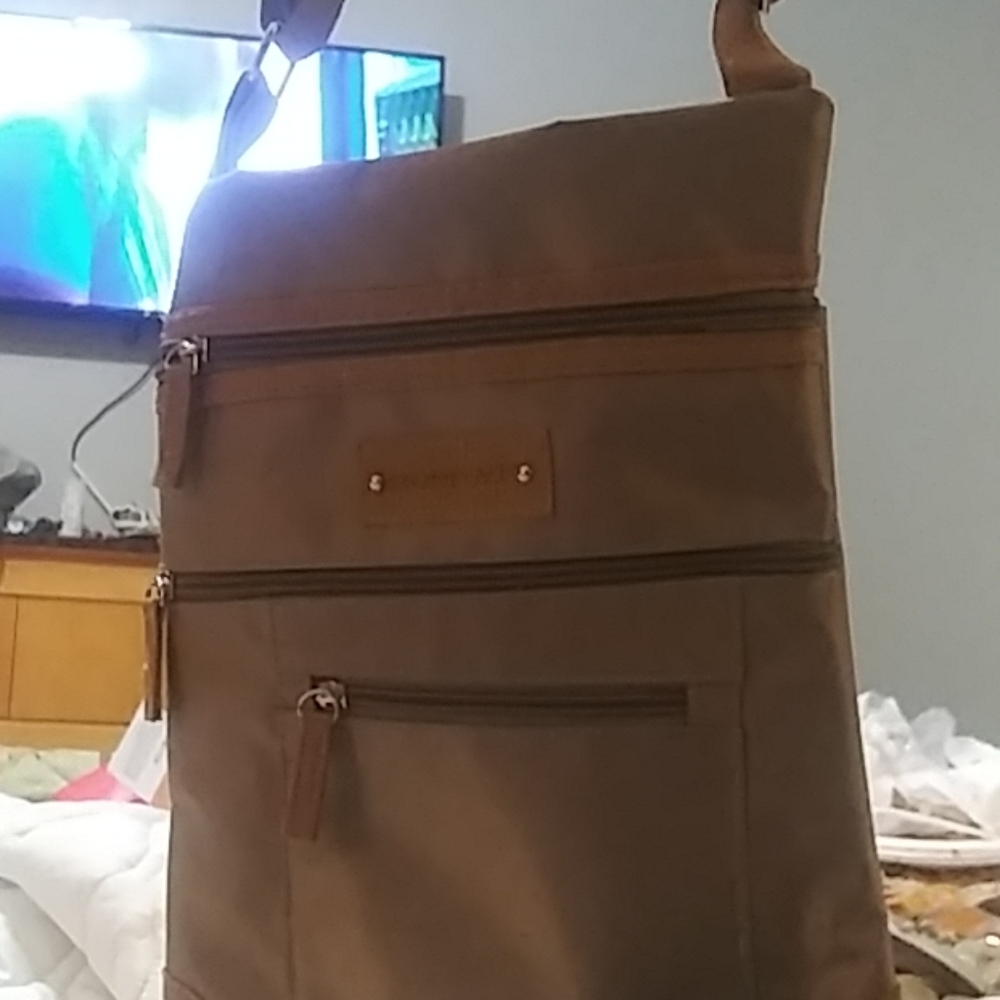 Stone.ny leather trim adjustable strap